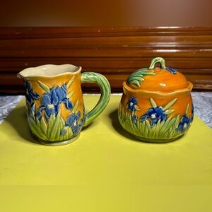 vintage Majolica-style ceramic cream pitcher and sugar bowl set with a lid